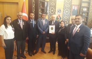 Şehit aileleri ve gaziler Bahçeli'yi ziyaret etti