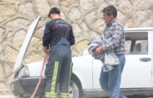 Serik'te seyir halindeki otomobilde yangın çıktı