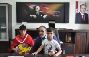 Milli güreşçi Remzi Temur, Afşin Belediye Başkanı Güven'i ziyaret etti