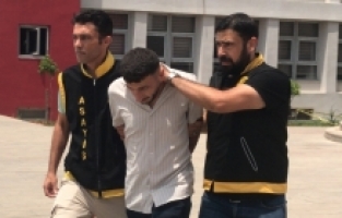 Adana'da tartıştığı arkadaşını silahla öldüren şüpheli tutuklandı