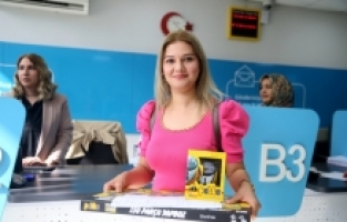 Kahramanmaraş'ta PTT'nin kuruluş yılında 183'üncü müşteriye sürpriz yapıldı