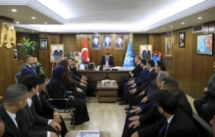 Ülkü Ocakları Genel Başkanı Yıldırım, Adana'da teşkilat mensuplarıyla görüştü